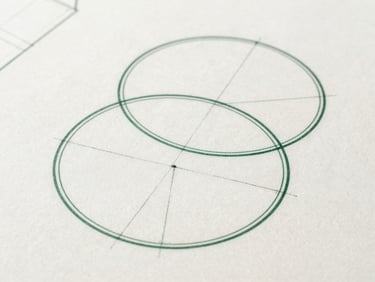 A clean abstract geometric blueprint showing structured overlapping circles and lines, fine architectural drafting style, deep green ink on off-white paper, editorial layout