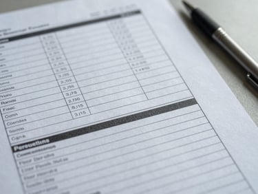 Close-up of a printed laboratory report on a desk beside a pen, pages showing data tables and a clear findings summary, bright flat lighting, cool gray tones, no personal information visible