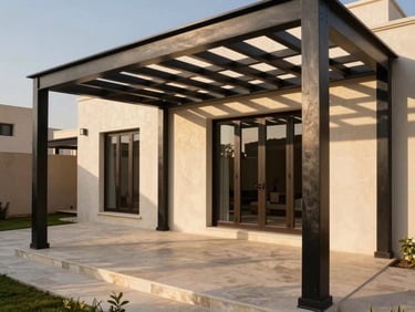 Architectural photography of a luxurious modern villa backyard in Riyadh, featuring a massive custom-engineered black powder-coated steel pergola casting sharp geometric shadows on stone flooring, warm golden hour sunlight, 35mm