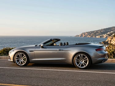 Luxury convertible parked on a coastal road during golden hour, sharp focus, premium editorial travel photography