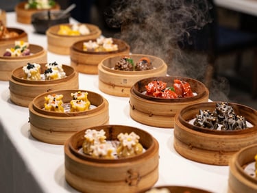 A beautifully arranged catering table at a modern community event, featuring bamboo steamers filled with hot dimsum, elegant setup, warm lighting