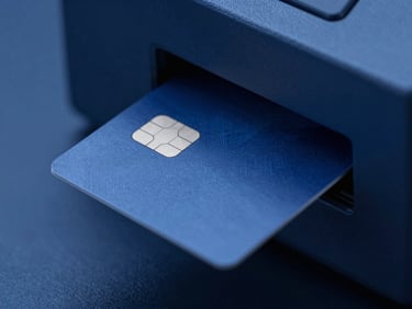 Close-up of a secure chip card being inserted into a card issuance machine, cool blue studio lighting, macro details, professional, clean