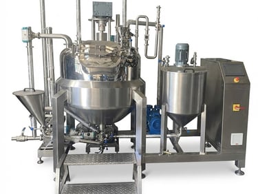 Stainless steel industrial vacuum emulsifying mixer machine for pharmaceutical and cosmetic processing.