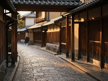 Quiet cobblestone alley in Kyoto, Japan, soft golden hour light filtering through wooden arches, elegant atmospheric travel