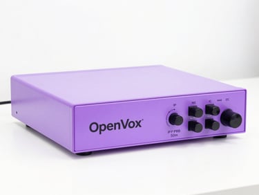 Close-up of OpenVox IP PBX equipment on a clean white desk, bright high-key studio lighting, vibrant light purple accents, 50mm