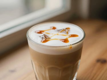 An iced specialty latte with a drizzle of amber caramel syrup, warm morning light, shallow depth of field, 35mm