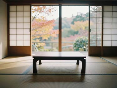Wide environmental shot of a traditional Japanese tatami room with modern low tables, large windows showing autumn foliage, soft golden hour light, 35mm film look