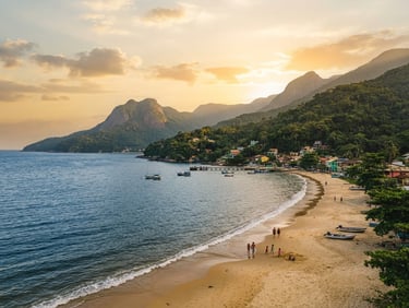 Wide environmental landscape of Praia de Muriqui at golden hour, where the lush green Atlantic forest mountains meet the calm blue ocean, soft sunlight, 35mm film aesthetic.