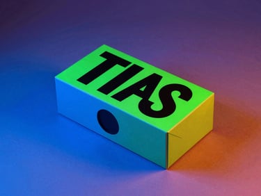 Vibrant studio photography of a high-contrast physical brand mockup with sharp hard shadows and electric blue neon gel lighting