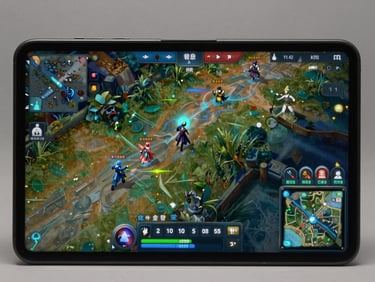Android device screen showing a real-time strategy game interface with unit selection overlays, minimap in lower right, teal active-state highlights, flat studio lighting, no bokeh