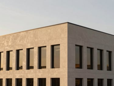 Architectural detail of a modern professional building in Phoenix, clean lines, warm desert sky in the background, soft natural light, architectural editorial photography, 35mm