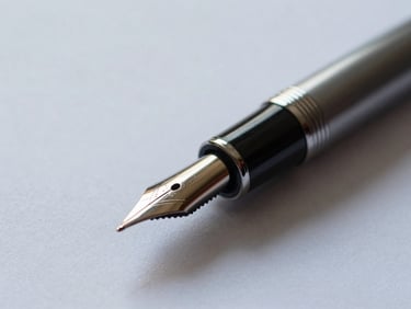Extreme close-up of a luxury fountain pen resting on a thick textured contract paper, soft cool natural daylight from the side, sharp focus on the metallic nib, minimalist corporate setting.
