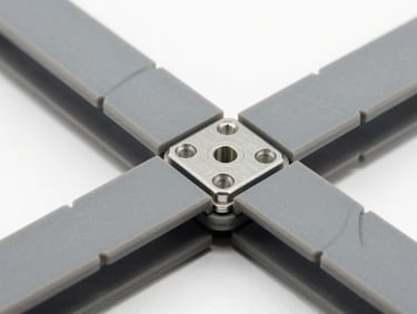 Macro studio shot of modular plastic interlocking belt links, mechanical joint detail, sharp focus, cool slate gray tones