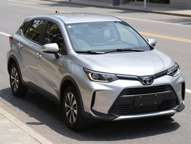 A modern silver Toyota Raize parked on a clean asphalt road, bright natural daylight, elegant reflections, 35mm.