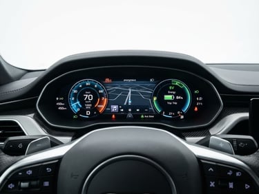 Crisp studio shot of a modern car dashboard displaying digital metrics, clean white background, high-key lighting, 35mm