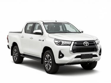 New Toyota Hilux, front three-quarter view, studio light, clean white background, sharp focus, 35mm