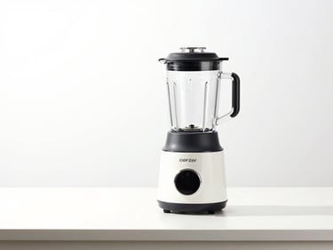 Clean studio shot of modern kitchen utensils and a blender on a bright white counter, high-key lighting