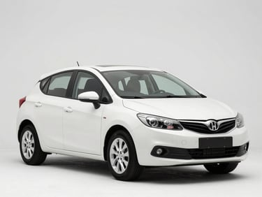 Three-quarter front angle shot of a clean white compact hatchback car in a bright studio, sharp lighting, pristine condition