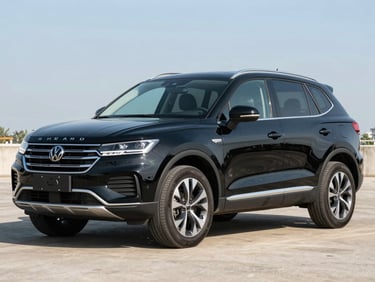Three-quarter front angle shot of a robust black compact SUV under bright daylight, highlighting clean contours and high road clearance