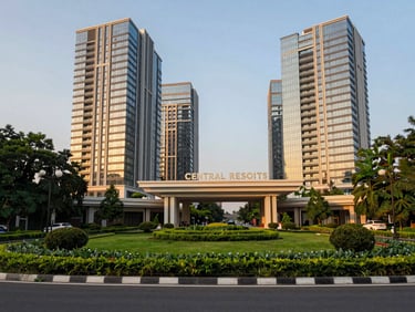 Lush green landscaped entrance of Central Park Resorts on Sohna Road, modern high-rise towers in background, golden-hour light