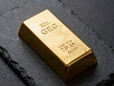 Overhead flat-lay of a 1 kilogram gold bar on dark slate, cool strobe light at a low angle emphasising stamped serial and assay marks, extreme surface detail visible, no props