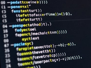 Macro shot of high-contrast syntax-highlighted code on a dark screen, cool screen-glow highlights, sharp focus on system logic.