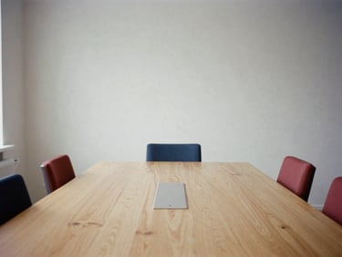 Minimalist Scandinavian boardroom with natural light, a large wooden table, and subtle technology integration, 35mm film.