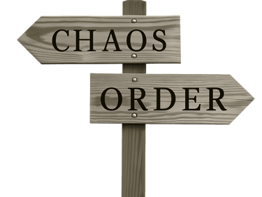 Rustic wooden signpost with arrows pointing to Chaos and Order
