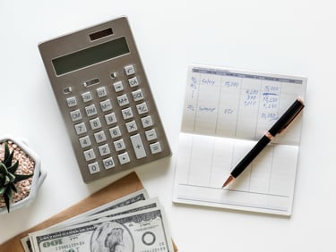a calculator and a calculator on a desk