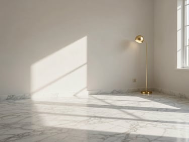 Sun-drenched minimalist living room with Italian marble flooring, bespoke champagne-gold fixtures, and clean architectural lines.