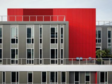 a building with a red and white building with a red and white building in the