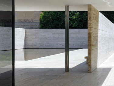 a large open space with a concrete wall and a concrete wall