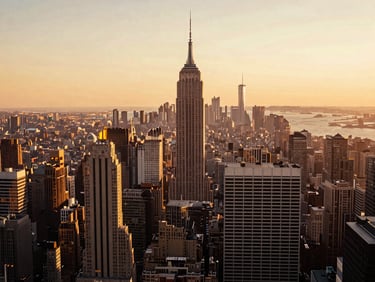Warm editorial photography of the Manhattan skyline from a high-rise terrace, soft sunset light, rich saturated tones, 35mm lens