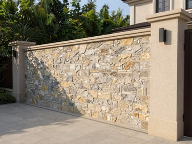 Close-up of natural stone masonry and clean-cut estate borders of a luxury residential property, crisp morning light
