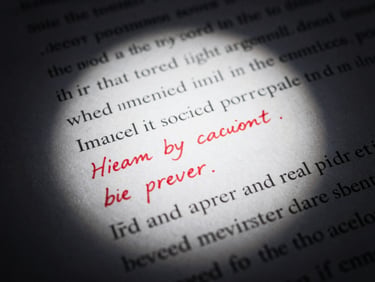 Extreme close-up of a hand-written speech draft with heavy red ink edits, dramatic spotlight, high-contrast chiaroscuro, sharp focus.