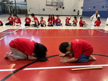 kids bowing to each other in calgary aikido class