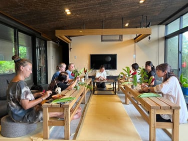 Participants engaging in a community workshop during the 'Starlit Ethnobotanical Wonders' project at Ma Umi Residencies