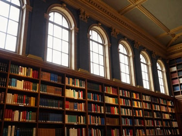 Wide environmental shot of a grand, historic library interior with towering bookshelves, soft light filtering through large windows, evoking a sense of global knowledge.