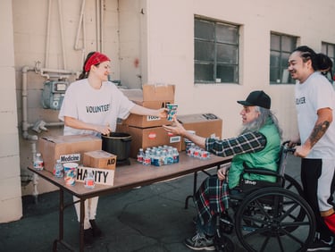 a man in a wheelchair wheel chair with a woman in a wheelchair