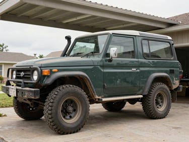 Documentary shot of a dusty dark green 4x4 offroad vehicle parked under a car port, flat front left tire, soft overcast daylight