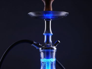 Close-up of a sleek modern glass hookah stem, bubbles visible in the chamber, vibrant blue under-glow