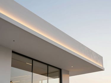 Minimalist ceiling design with integrated linear lighting, warm hidden LED strips casting soft glow on clean white plasterboard, architectural detail