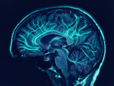 Macro close-up of an fMRI brain scan showing neural pathways in glowing teal and deep blue, high-contrast clinical medical photography, dark navy background, sharp focus, 35mm