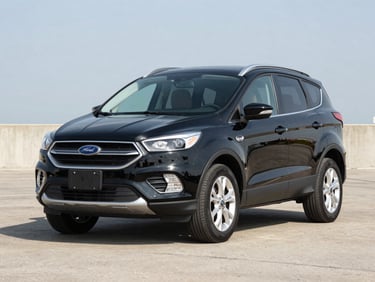 Three-quarter front view of a clean 2018 Ford Escape in black on a bright outdoor lot under even daylight, neutral asphalt background, no people