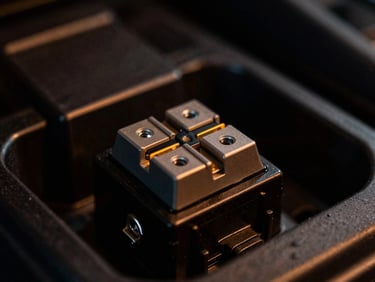 Technical close-up of a car fuse box with a neat plug-and-play fuse tap connector, ambient amber highlights, dark background, 35mm lens