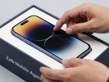 Close-up of hands carefully placing a smartphone into a secure, branded Zaib Mobile Agency delivery box, studio lighting.