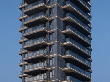 High-end vertical residential tower with concrete cantilever balconies and geometric architectural lines, twilight lighting