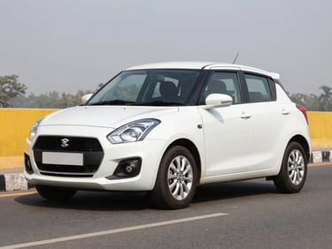 Crisp three-quarter shot of a clean, modern white Swift Dzire taxi, parked against a clean highway setting near Delhi, bright clear daylight, high-contrast yellow and charcoal tones, sharp focus, 35mm lens.