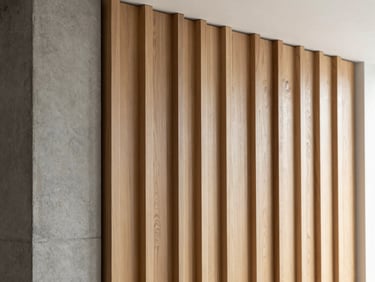 Bespoke architectural joinery detail, oak wood panels aligning perfectly with a concrete column, soft natural side light, professional architectural photography, 35mm lens.