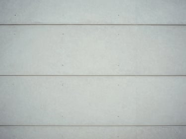 Minimalist architectural photography of clean concrete lines and soft overcast daylight shadows, 35mm sharp focus